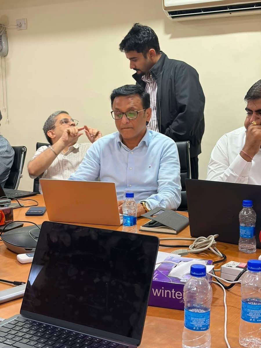 Working through a real task on a laptop during the Delhi session