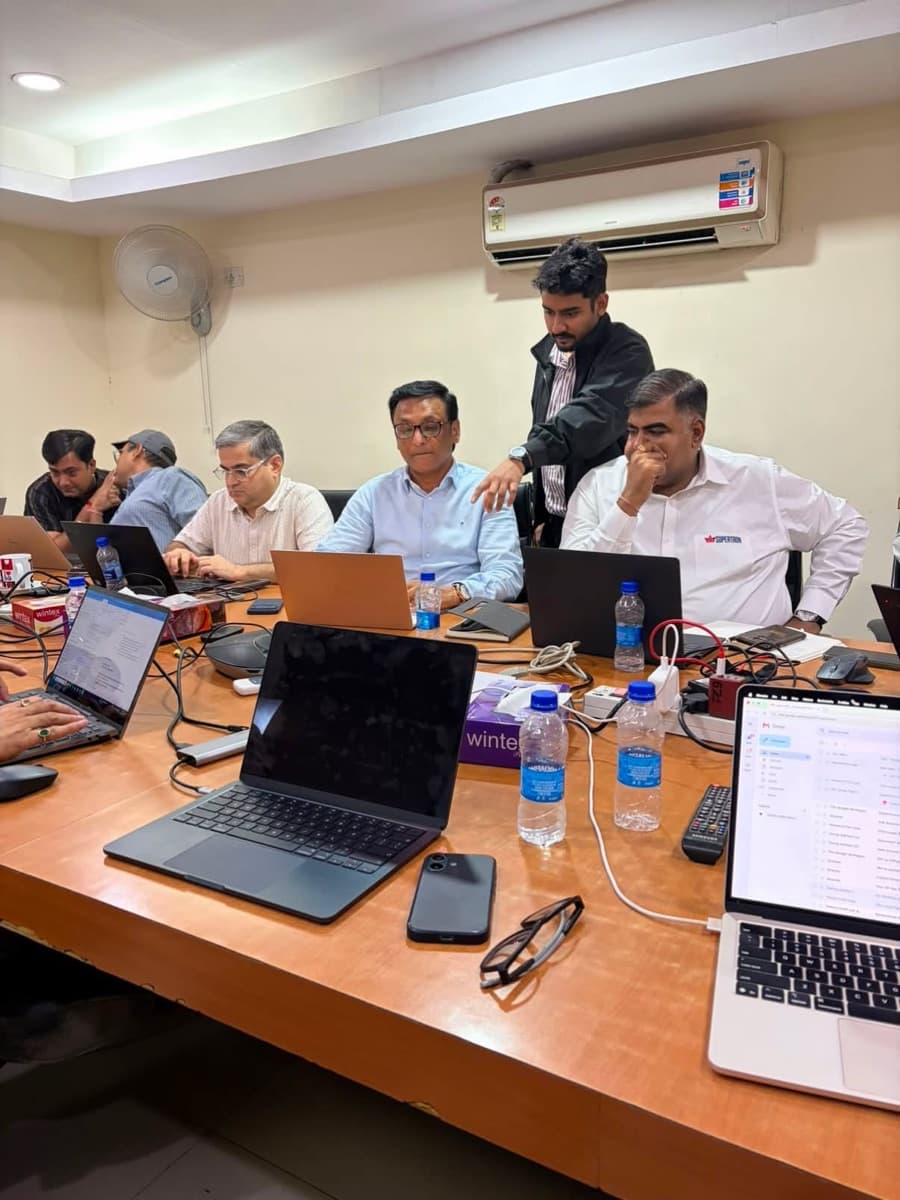 Helping one of the Delhi team set a tool up on their own machine